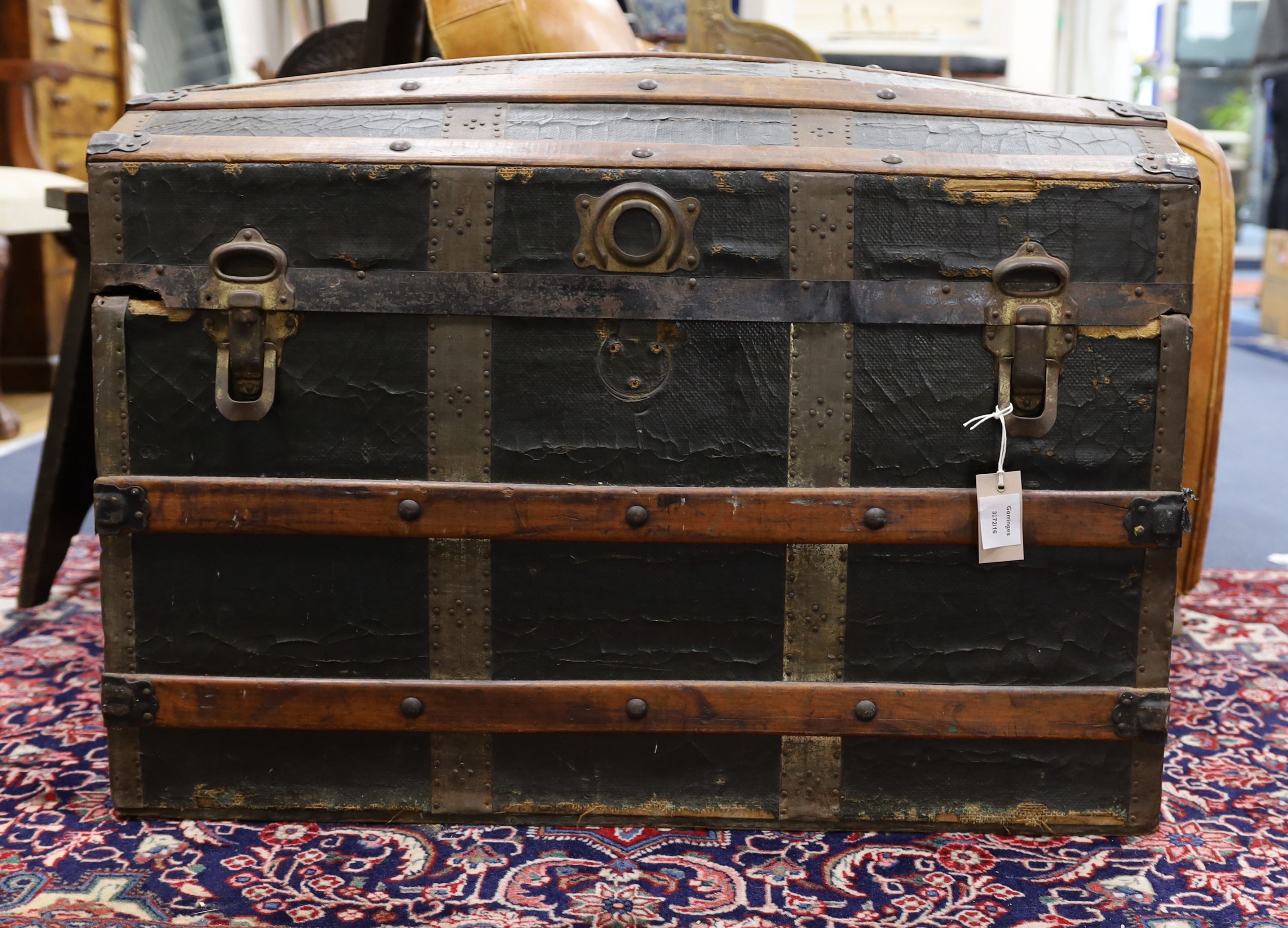 A late Victorian wood bound domed camphorwood and canvas covered trunk, length 85cm, depth 50cm, height 59cm